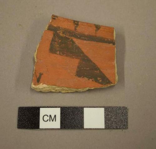 Ceramic rim sherd, black on red interior, red on buff exterior