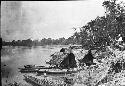 View of River with canoes and boats in Peru