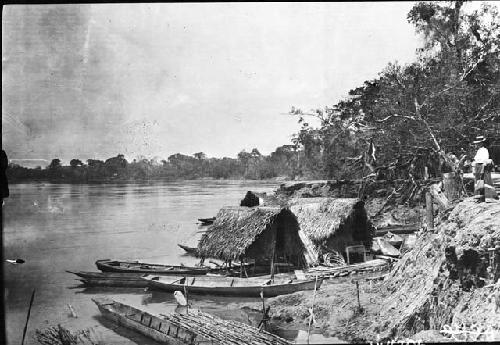 View of River with canoes and boats in Peru