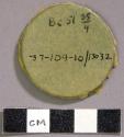 Leather fragment. May be gourd rind.