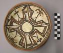 Bowl, polacca polychrome style c. int: linear design; ext: slipped, no design. 4