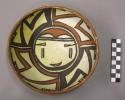 Bowl, polacca polychrome style c. int: kachina design; ext: slipped, no design.