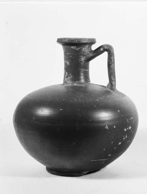 Roman red ware pottery jug