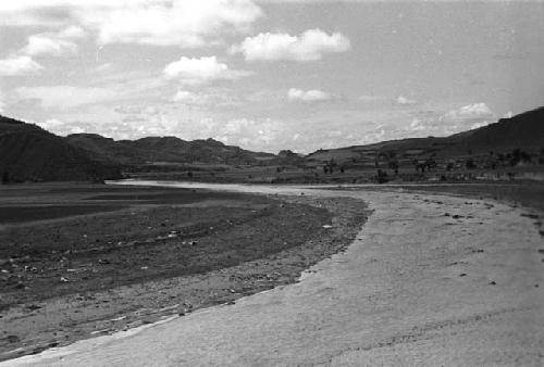 Landscape with river? and hills