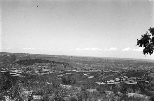 Landscape with hills, river and cultivated fields