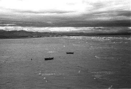 Sea with mountains in distance