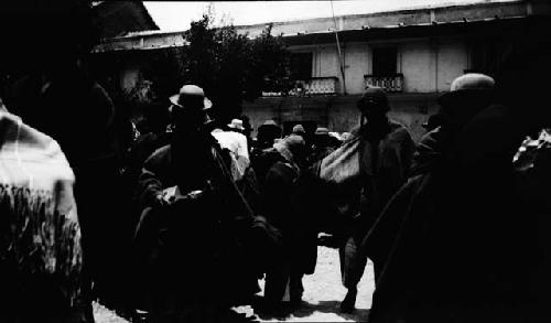 Crowd standing in street