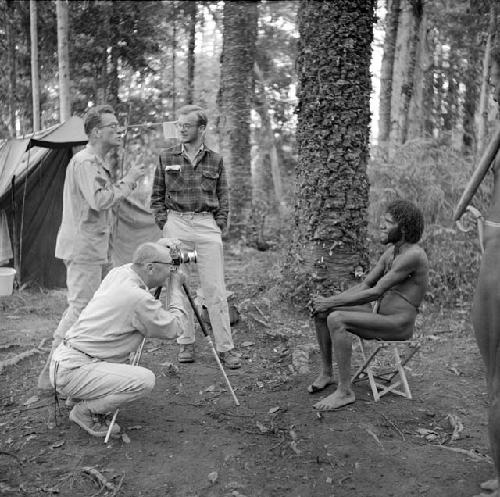 Eliot Elisofon taking a portait of Yosup in Homoak; Michael Rockefeller and Jan