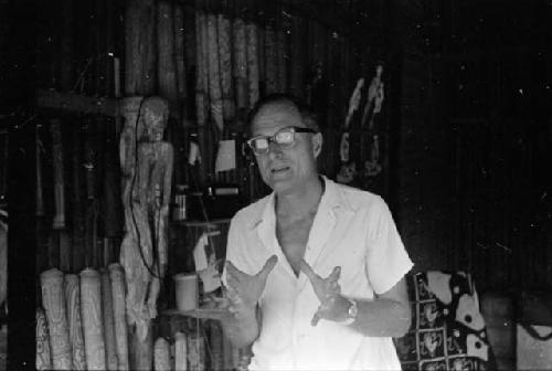 Portrait of Dr. A. A. Gerbrands talking using hands in his house at Ammanamgai