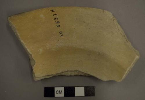 Ceramic dish sherd, flared rim, pigment on both