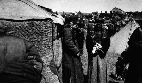 Women outside police tent