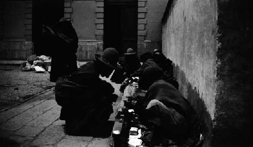 Vendors selling wares next to building