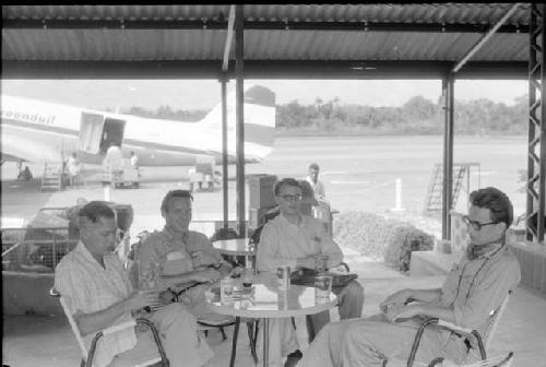 Karl Heider negatives, New Guinea; deBruyn, Robert Gardner and others waiting for plane to Baliem