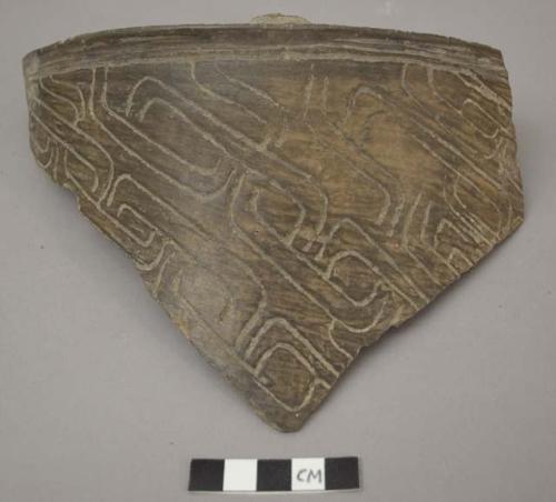 Partial vessel with incised exterior, foot missing