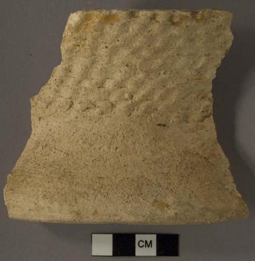 113 sherds of restorable corrugated pottery jar