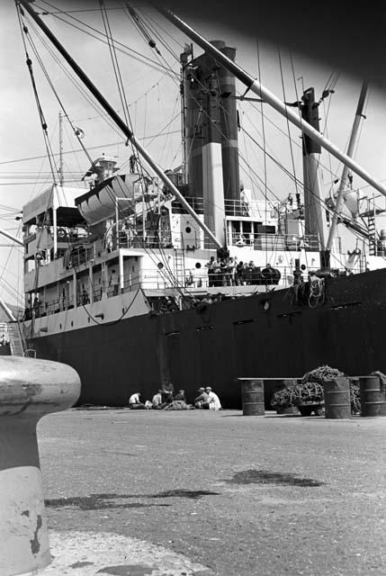 People aboard ship from a low angle shot