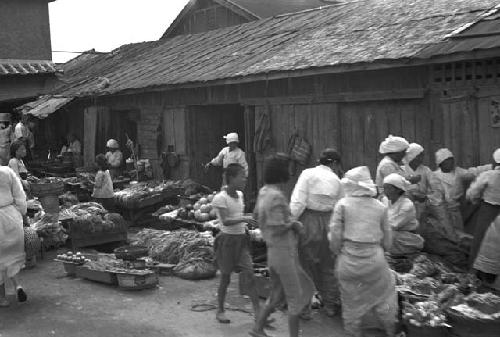 Civilians shopping at the marketplace