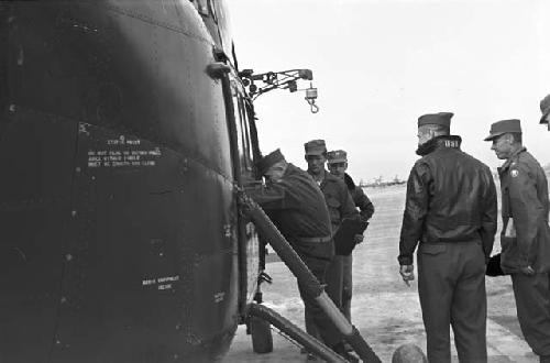 Soldiers boarding chopper