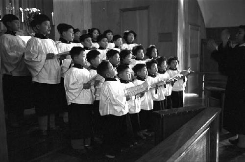 Portrait of children singing in choir