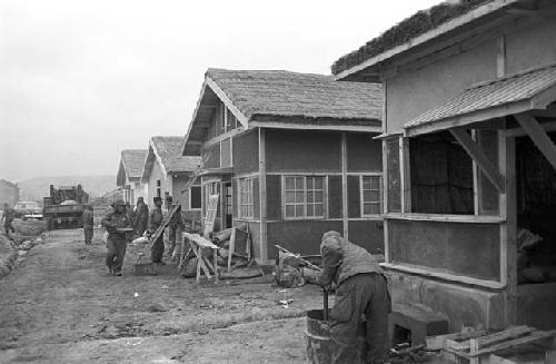 Portrait of Koreans working on houses