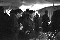 Soldiers at drinking table observing drinks