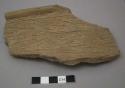 Sherd with grass impressed decoration