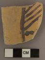 Reused Awatovi black-on-yellow potsherd