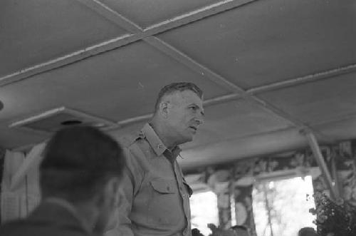 Man standing addressing audience