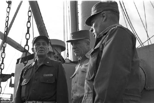 Portrait of three soldiers having meeting