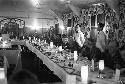 Portrait of soldiers being served in dining hall