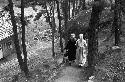Women walking along pathway together