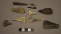 Small, pointed ground stone implements