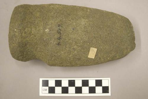 Ground stone, grooved axe with flat base and end