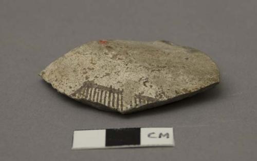 Ceramic sherd, body, incised linear design.