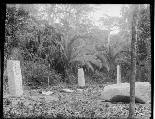 Stelae A, B, C, and Sculpture B