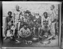 Group of men in native dress with equipment