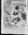 Women with children in rural landscape