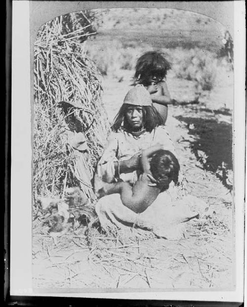 Women with children in rural landscape