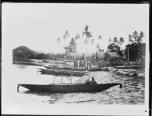 Village with boats at beach