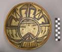 Bowl, polacca polychrome style c. int: kachina design; ext: slipped, no design.