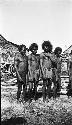 Group of village men by boat