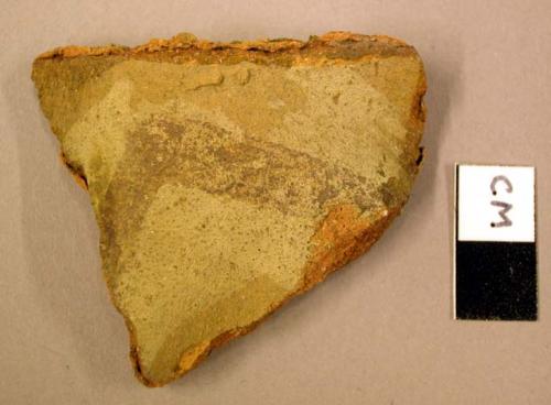 Ceramic rim sherd, brown on buff linear decoration