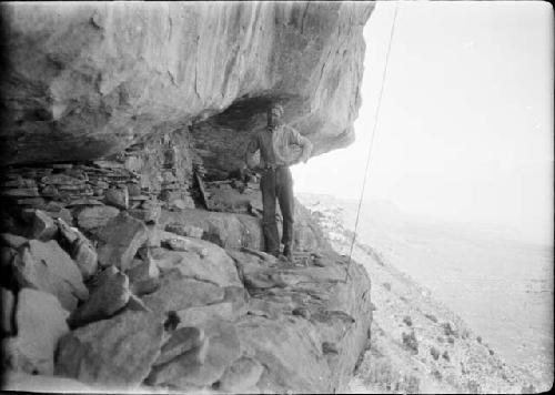 Crew Member on Rock Ledge, Site E-12-4