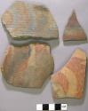 Body sherds decorated with red linear and geometric designs, sherds have all or partially gray surfaces, one with corrugated exterior