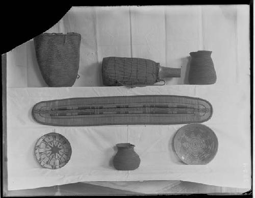 Congo shield and drum and baskets from northwest coast and California