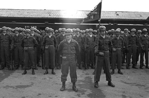 Portrait of soldiers in formation stance
