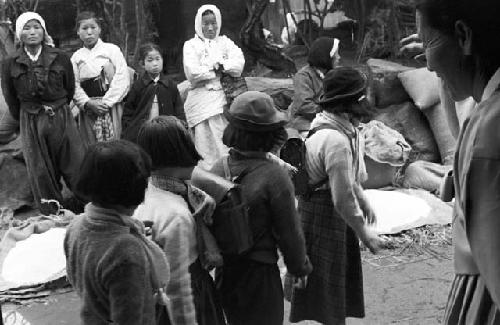 Portrait of children in uniform walking along road together