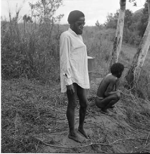 Wali dressed in shirt in dark glasses about to go down for the first time in his life to Wamena