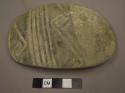 Black on white reused potsherd