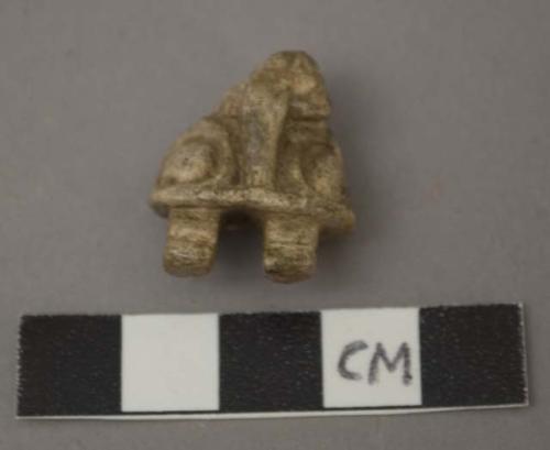 Carved bone animal head, fragment